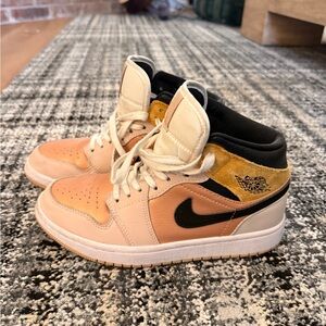 Air Jordan Mid Sneakers in Black and Gold